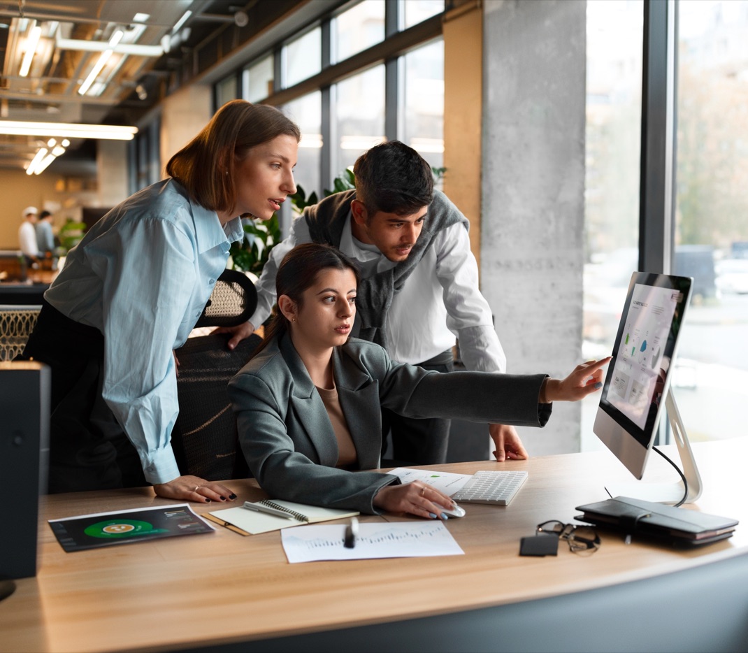 ThinkPalm engineers collaborating on an enterprise software solution