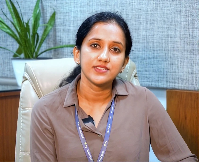 A ThinkPalm engineer at her desk